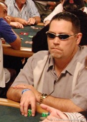 Don Tinordi rocking his cool glasses at a poker table.