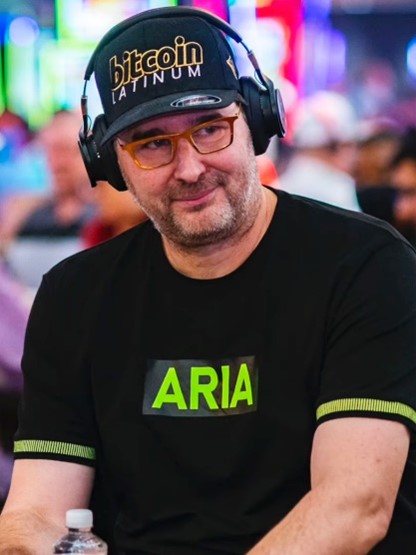 Phil Hellmuth staring down his opponent at a poker table.