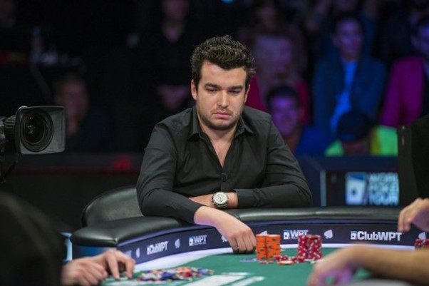 Poker player Chris Moorman staring at the board.