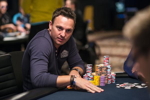 Poker player Sam Trickett in the tank with ha mountain of chips.
