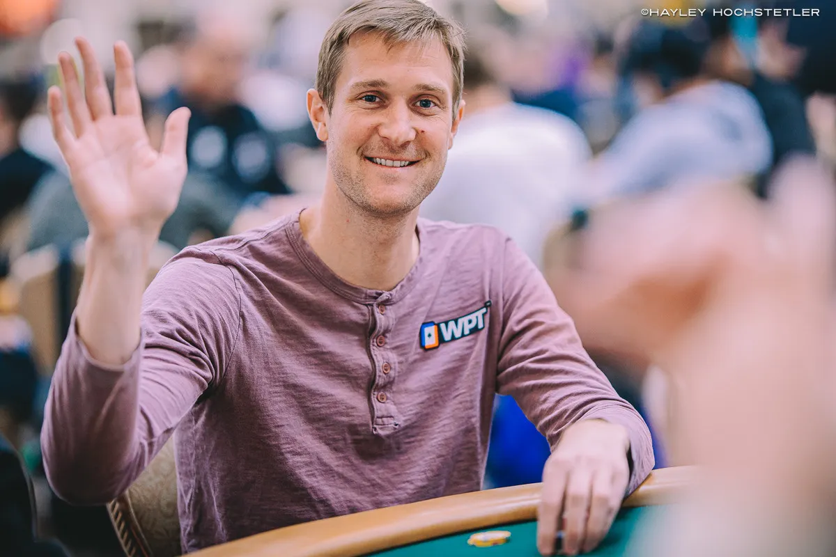 Brad Owen is playing poker tournament and welcoming the photographer.