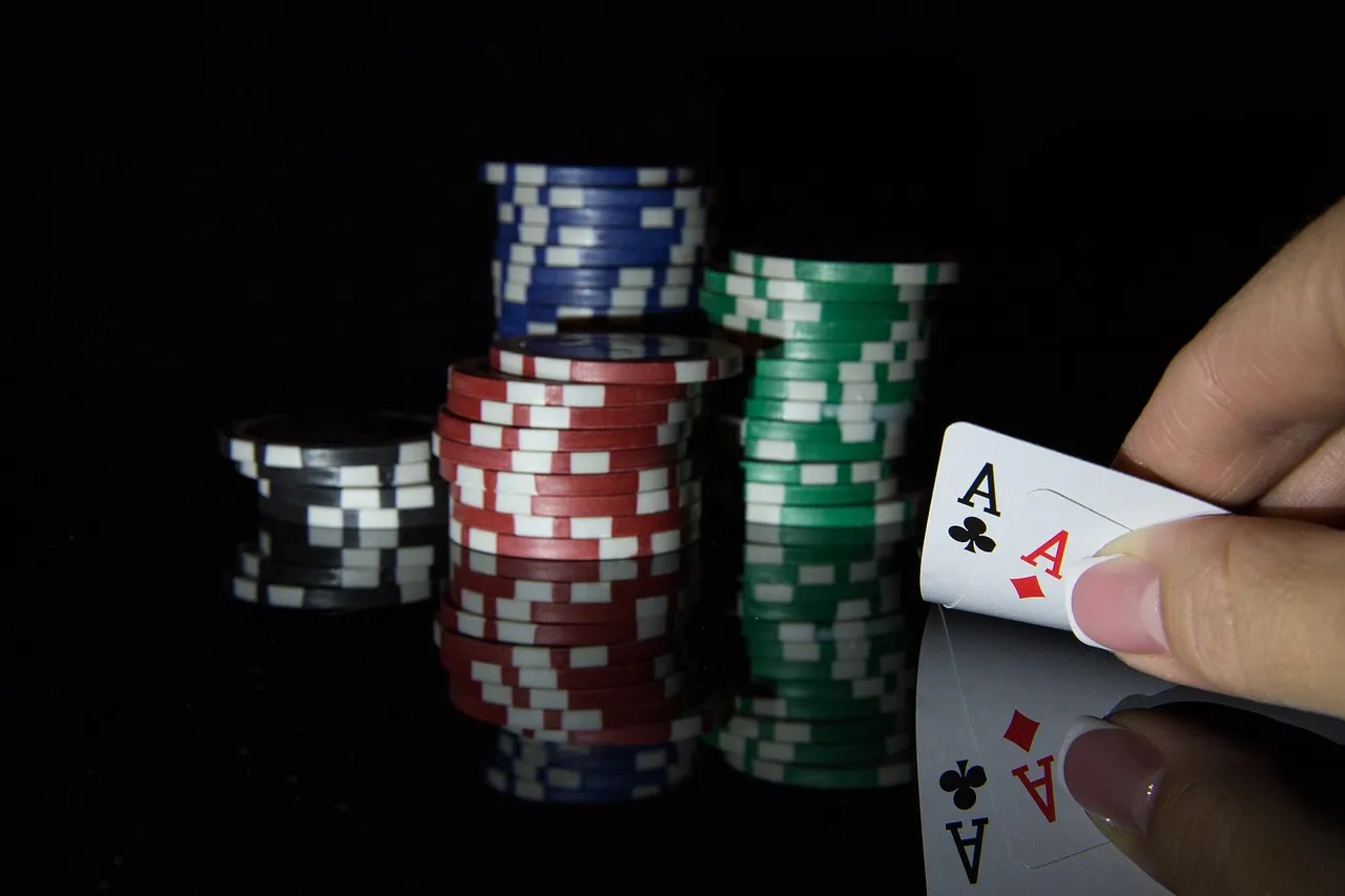 two cards and stakes in poker.
