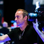 Richard Hayes is making an interview during poker tournament.