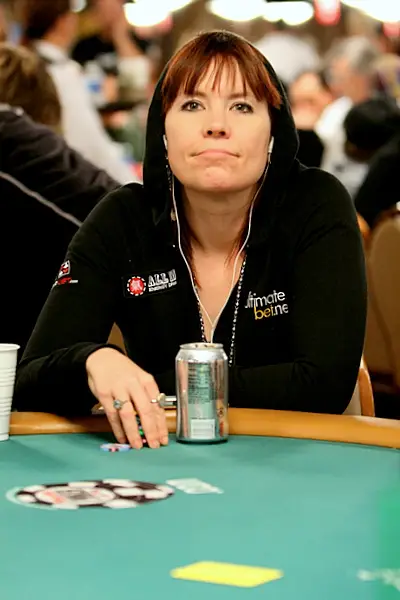 Annie Duke playing poker and thinking about something.