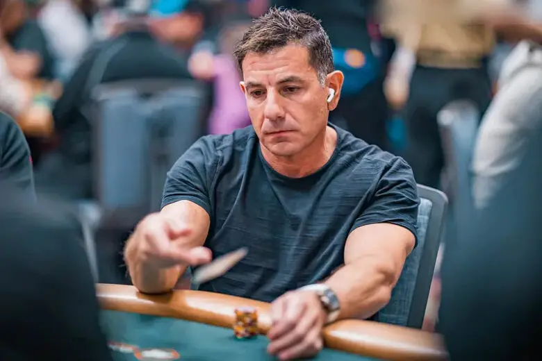 A dynamic shot of Brandon Steven competing in a World Poker Tour event, his poker face steady as he navigates a tense hand. 