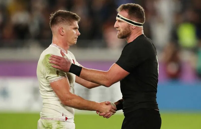 Players shaking hands at rugby