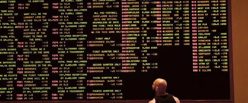 Player watching a Screen with list of Sports betting odds and options