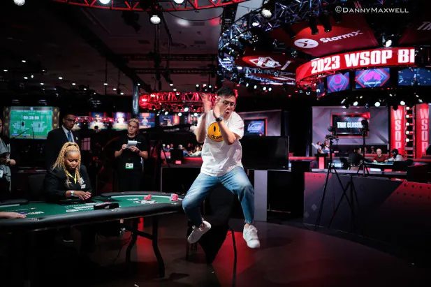 Pengfei Wang jumps for joy upon winning the bracelet