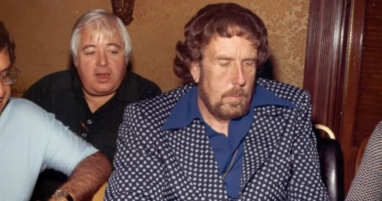 Jack Straus on the front and Eric Drache on the back