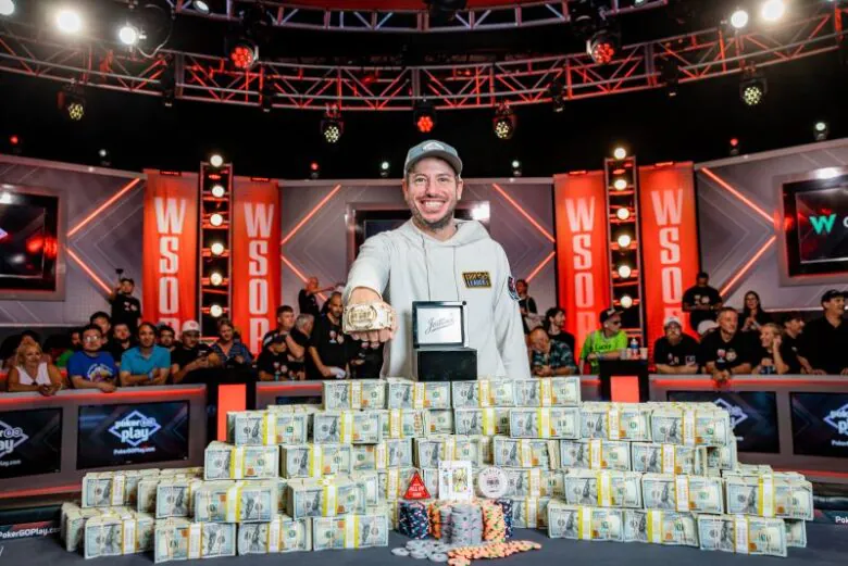 Daniel Weinman with his winnings in WSOP 2023 Main Event